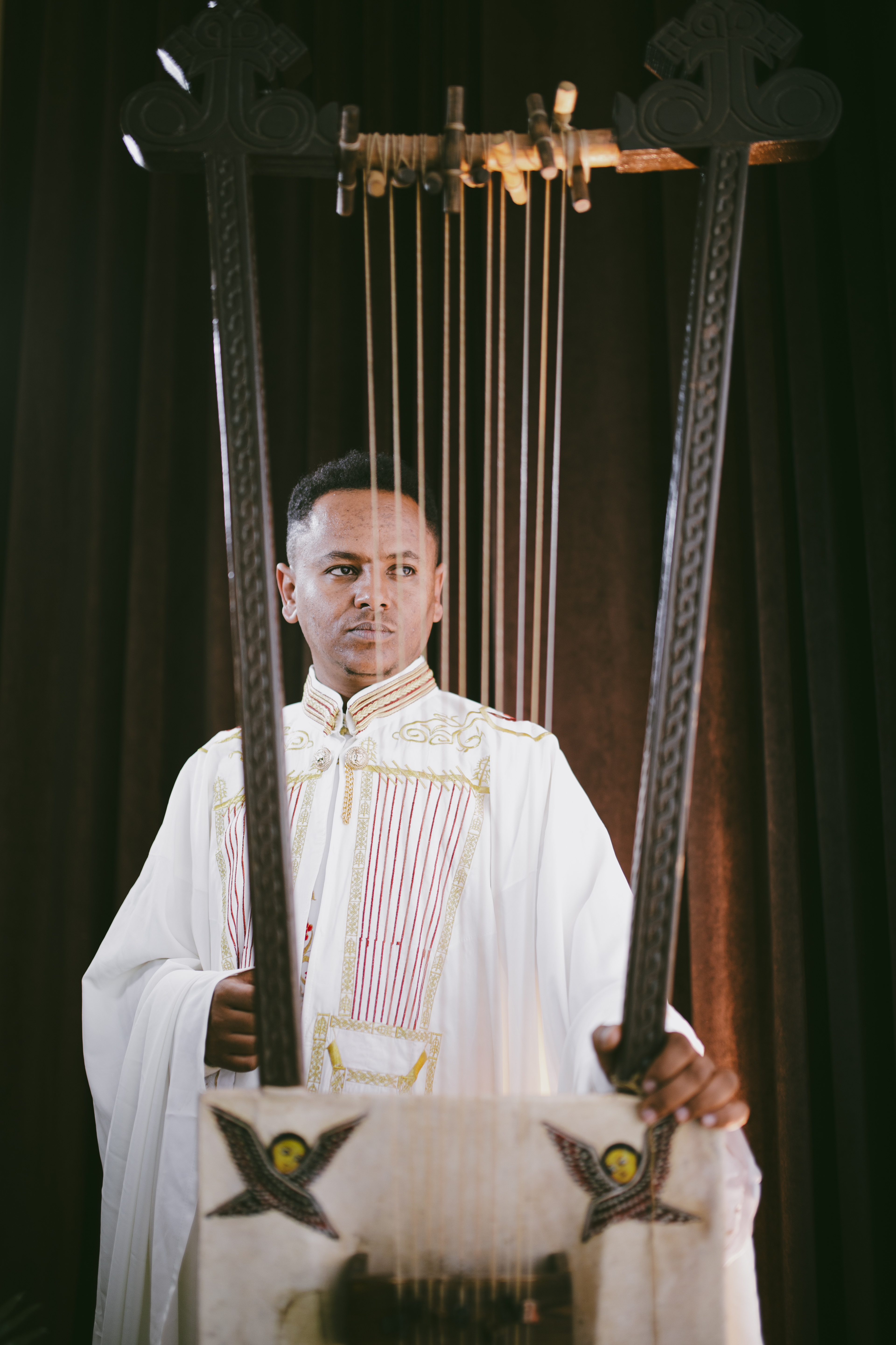 Master instructor አቤል ተስፋዬ with a Begena